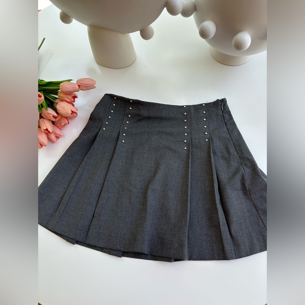 Grey pleaded skirt with silver embellishments